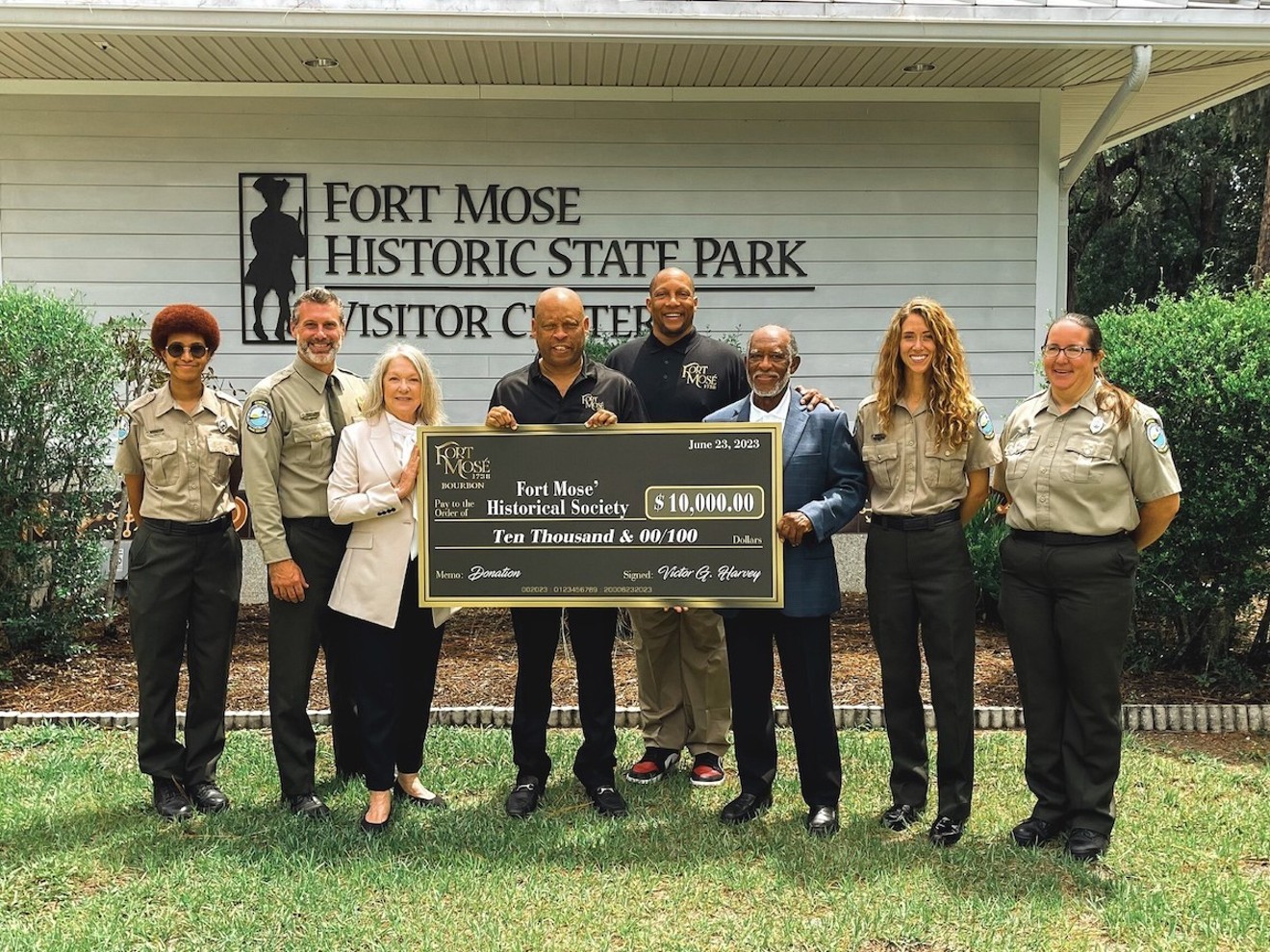 Victor George Spirits makes a $10,000 donation to the Fort Mosé Historical Society in June 2023.