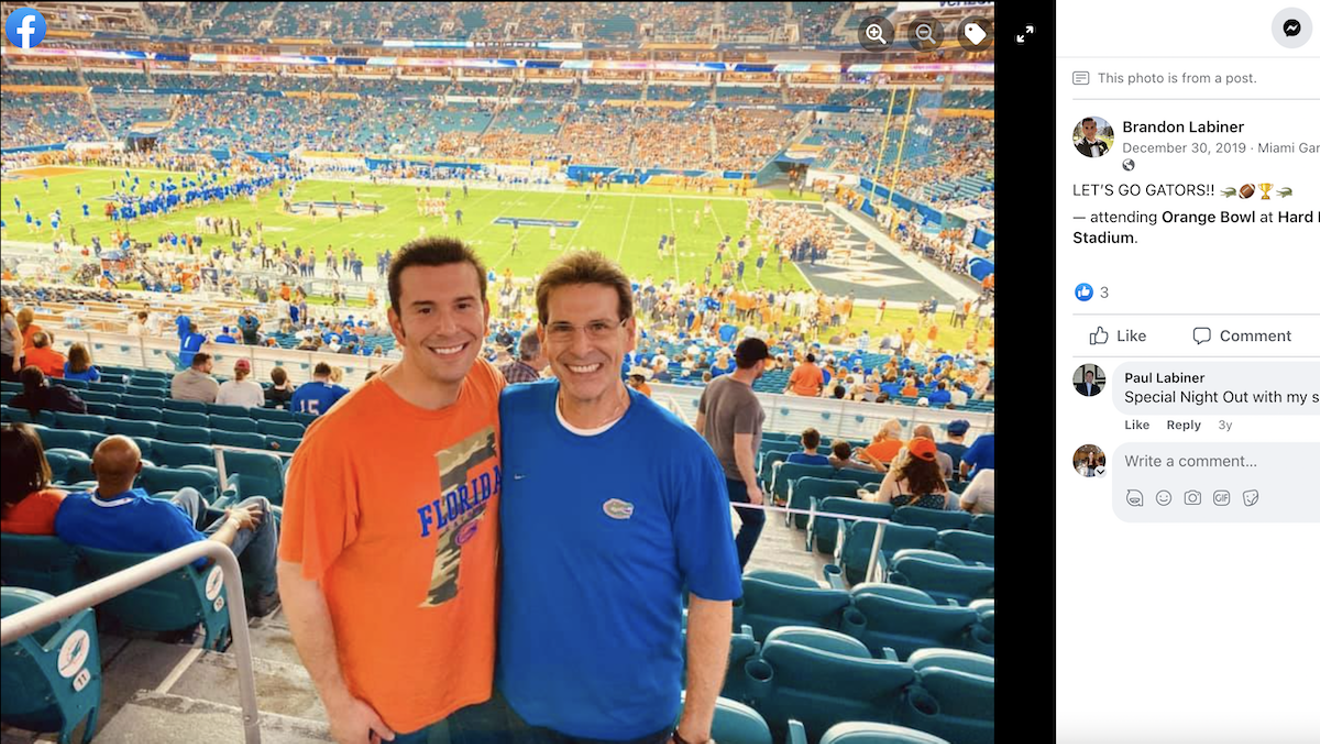 A photo posted on Facebook in 2019 shows Brandon Labiner and his father, Paul Labiner, at the Orange Bowl.