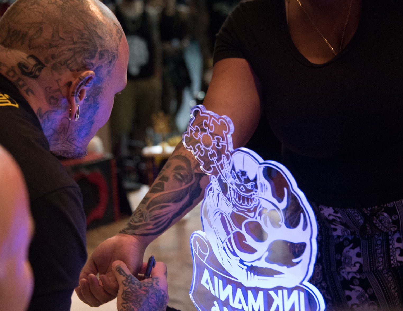 Tattoo artists ply trade at convention