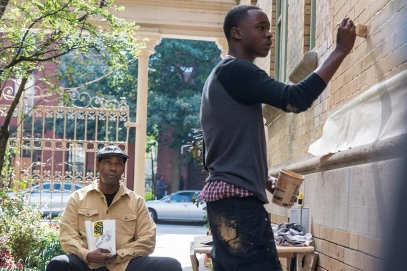 Denzel Washington (left) plays Robert McCall and Ashton Sanders is his neighbor Miles, a character who may be heading toward a life of crime, in director Antoine Fuqua's The Equalizer 2.