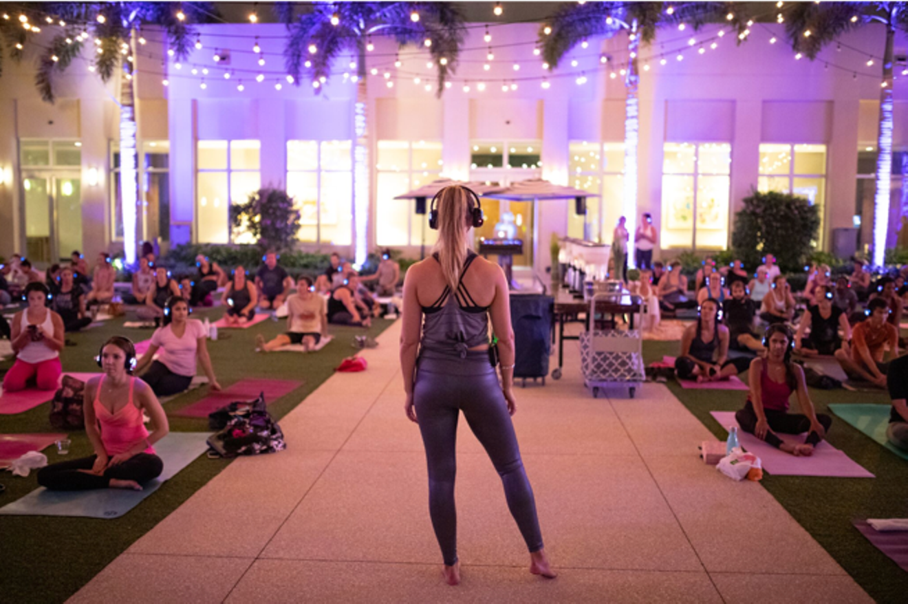 Jennifer Martin will lead another hopping sesh of Glow Yoga on Friday evening.