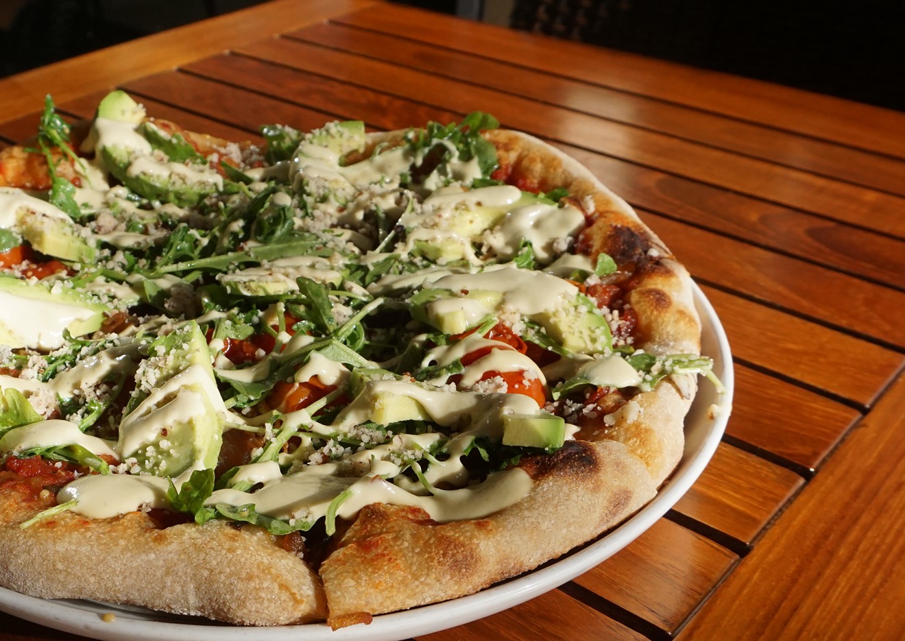 Gourmet avocado pizza at Christopher's Kitchen.