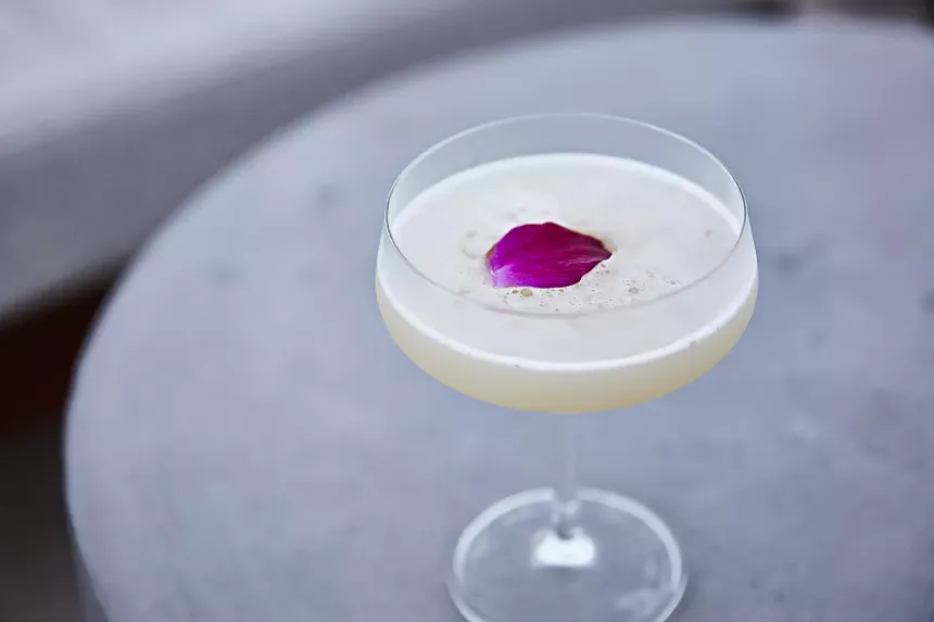Craft cocktails like the signature Lychee Blossom are part of Etaru's pre-holiday happy hour. - PHOTO COURTESY OF ETARU