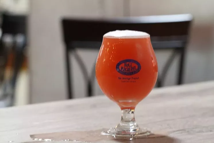 With an array of brews, barbecue, and community events, Holy Mackerel has quickly become a hot spot in Wilton Manors. - PHOTO BY NICOLE DANNA