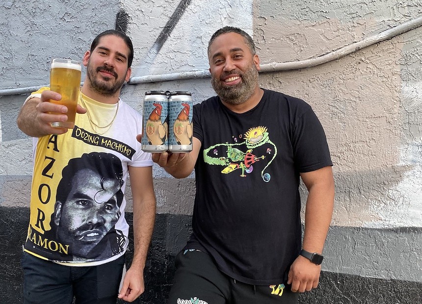 Miami Beer Week president Adrian Castro (left) and founder and vice president William Rivera raise a toast with "Lager Me Bro," the official collaboration beer available during the inaugural event. - PHOTO BY MARIO DANIEL ALVARADO