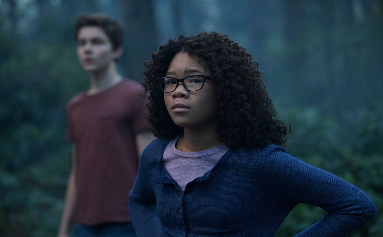Storm Reid (right) plays Meg, who hopes to find her missing father, and takes her new friend Calvin (Levi Miller) on a Technicolor search-and-rescue mission through time in Ava DuVernay’s A Wrinkle in Time.