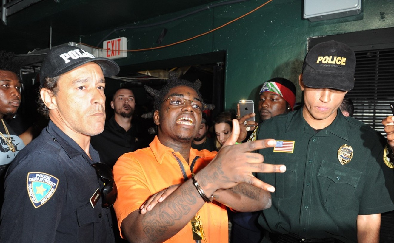Kodak Black poked fun at his legal problems when he posed as a prisoner before his show at the Watsco Center in 2017.